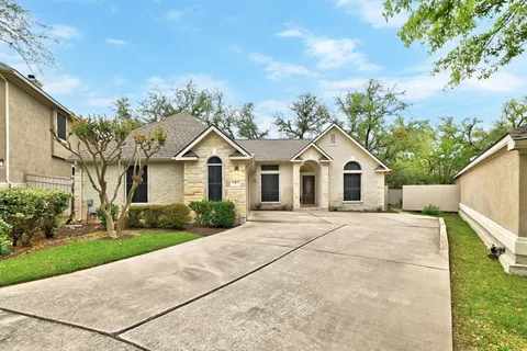 a view of house and outdoor space with yard
