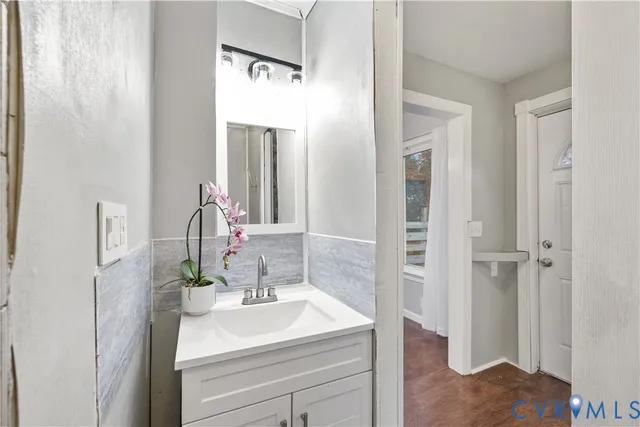 a view of front door and bedroom