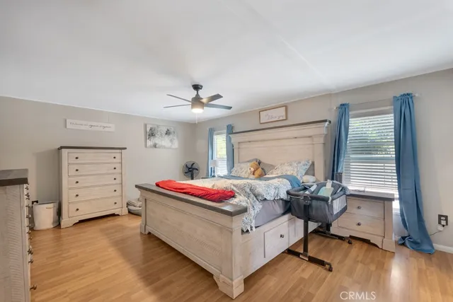 a bed room with a bed and a window