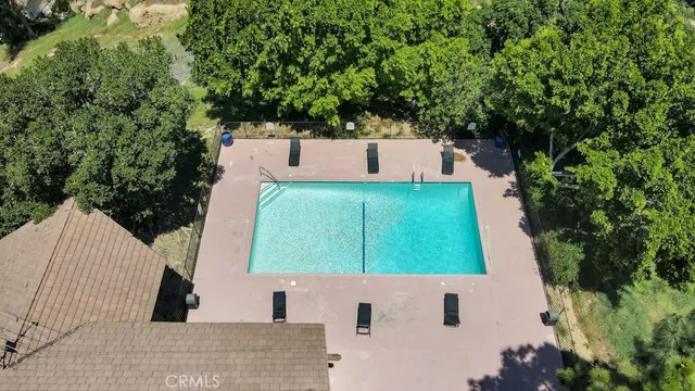 an aerial view of house with yard