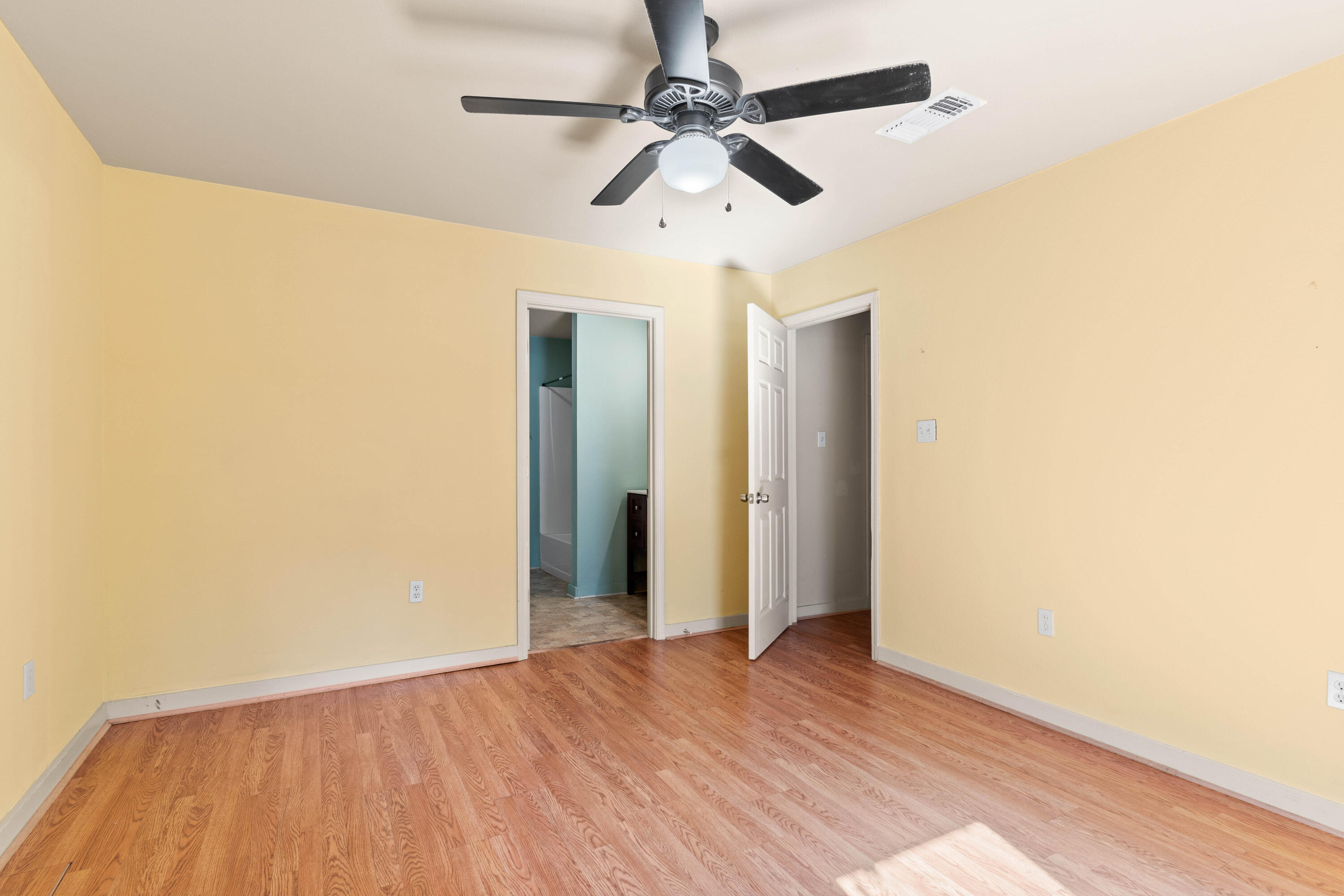 3591 Highway 20 Freeport, FL 32439 - Photo 15 of 23 a view of an empty room with wooden floor