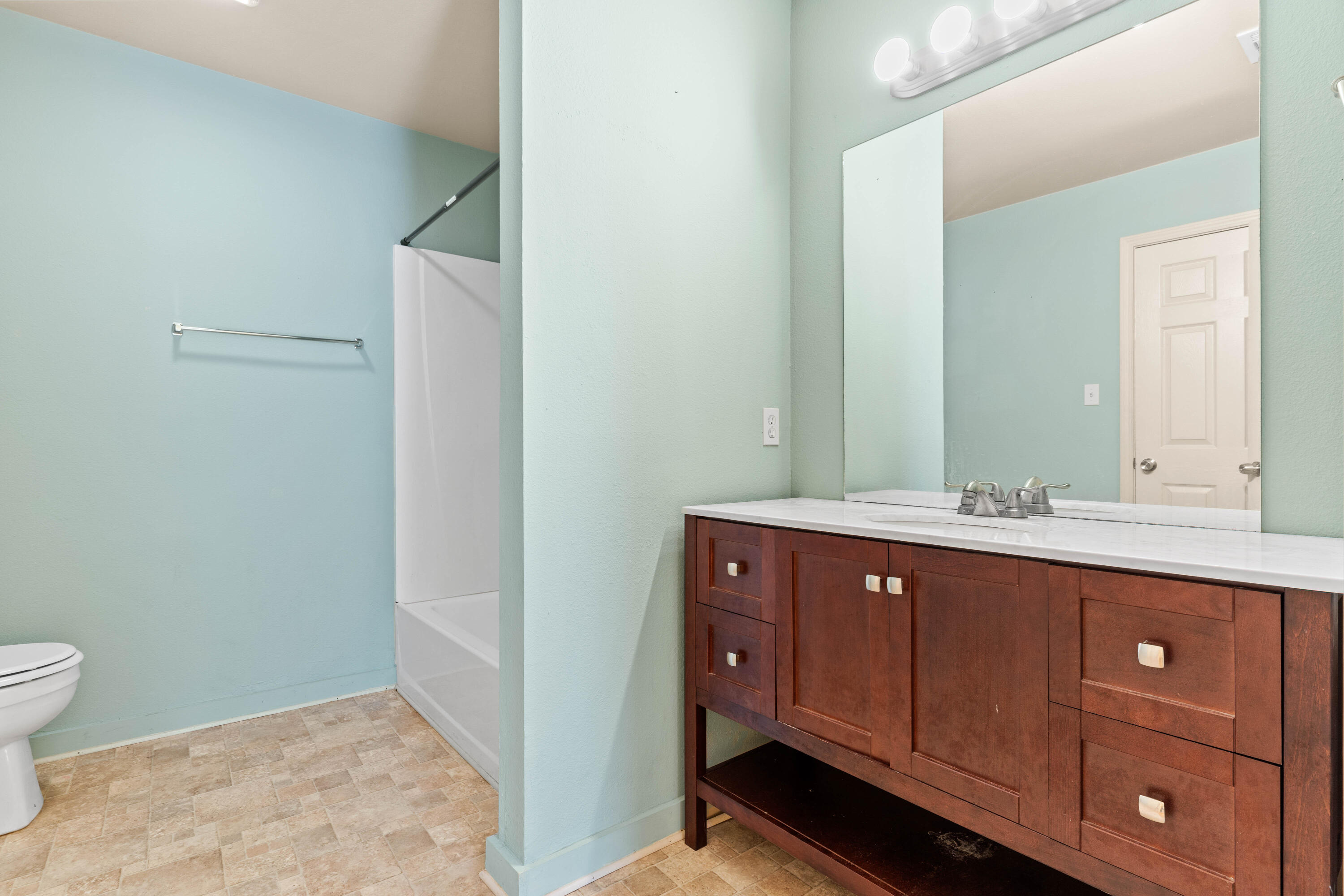 3591 Highway 20 Freeport, FL 32439 - Photo 16 of 23 a bathroom with a sink and a mirror