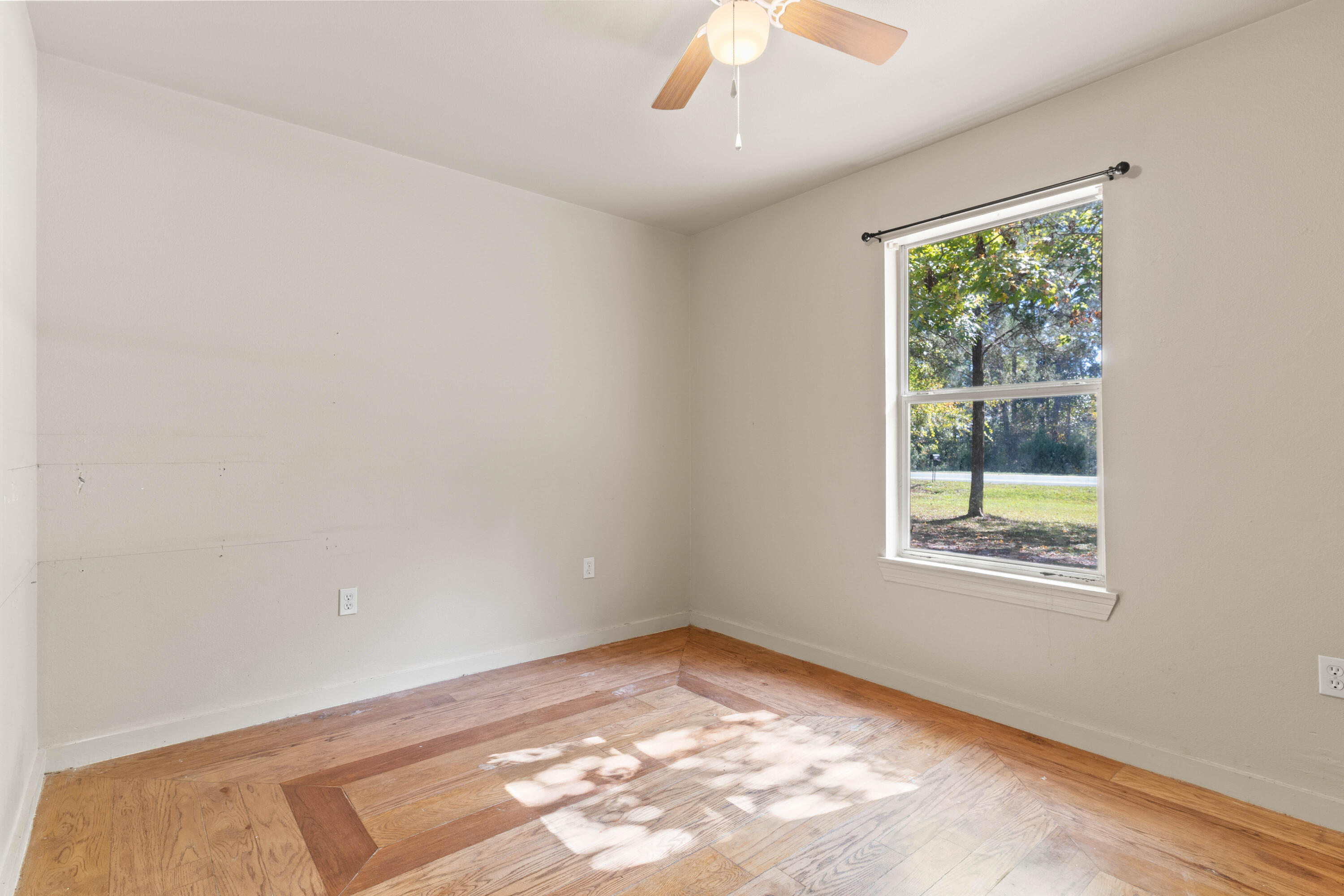 3591 Highway 20 Freeport, FL 32439 - Photo 18 of 23 a view of an empty room with a window
