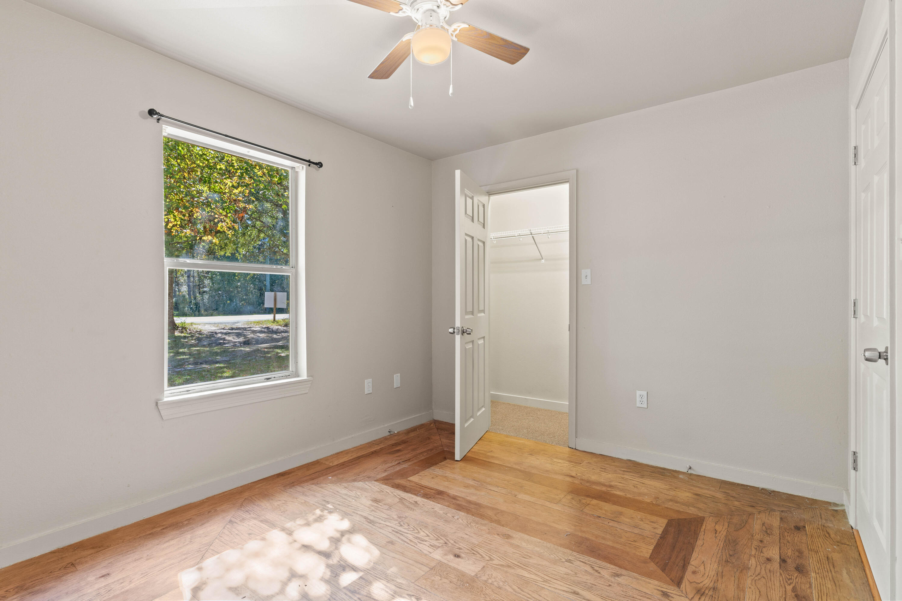 3591 Highway 20 Freeport, FL 32439 - Photo 19 of 23 a view of an empty room with a window