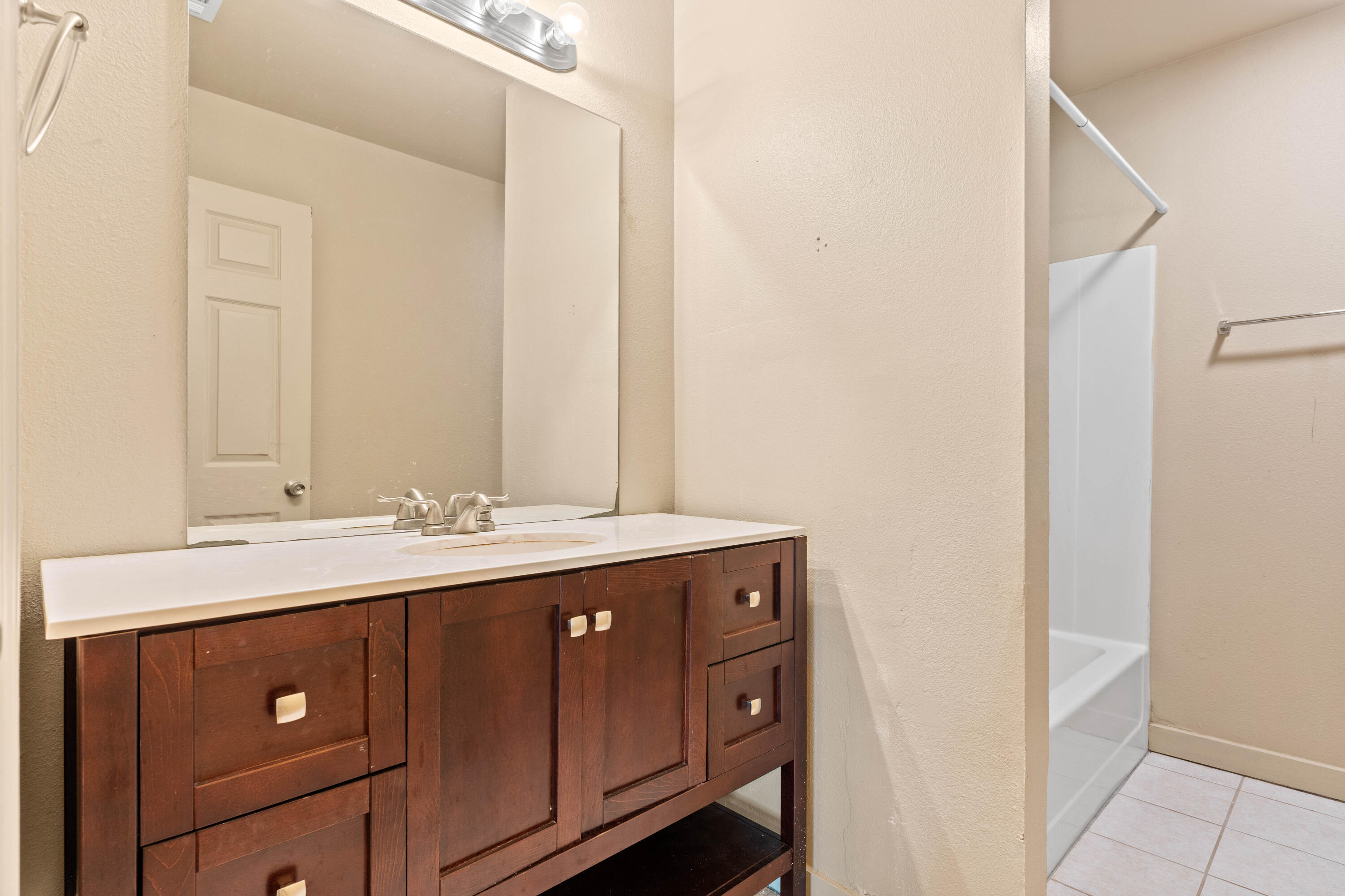 3591 Highway 20 Freeport, FL 32439 - Photo 20 of 23 a bathroom with a sink and a mirror