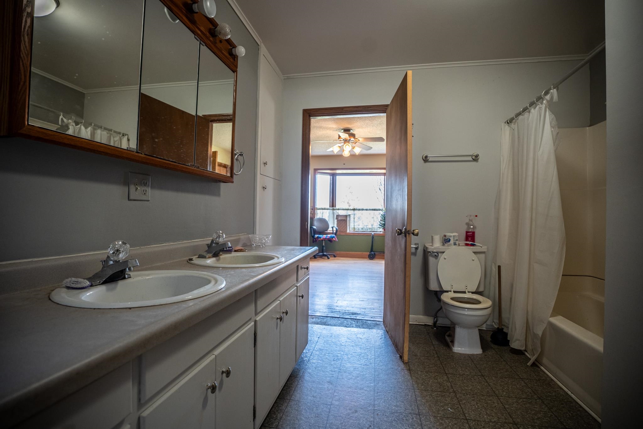 13965 East Dutch Road Rochelle, IL 61068 - Photo 15 of 50 a bathroom with a sink toilet and shower