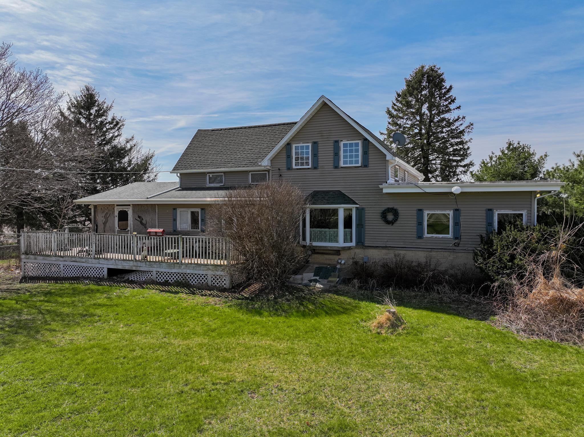 13965 East Dutch Road Rochelle, IL 61068 - Photo 2 of 50 a front view of a house with a yard