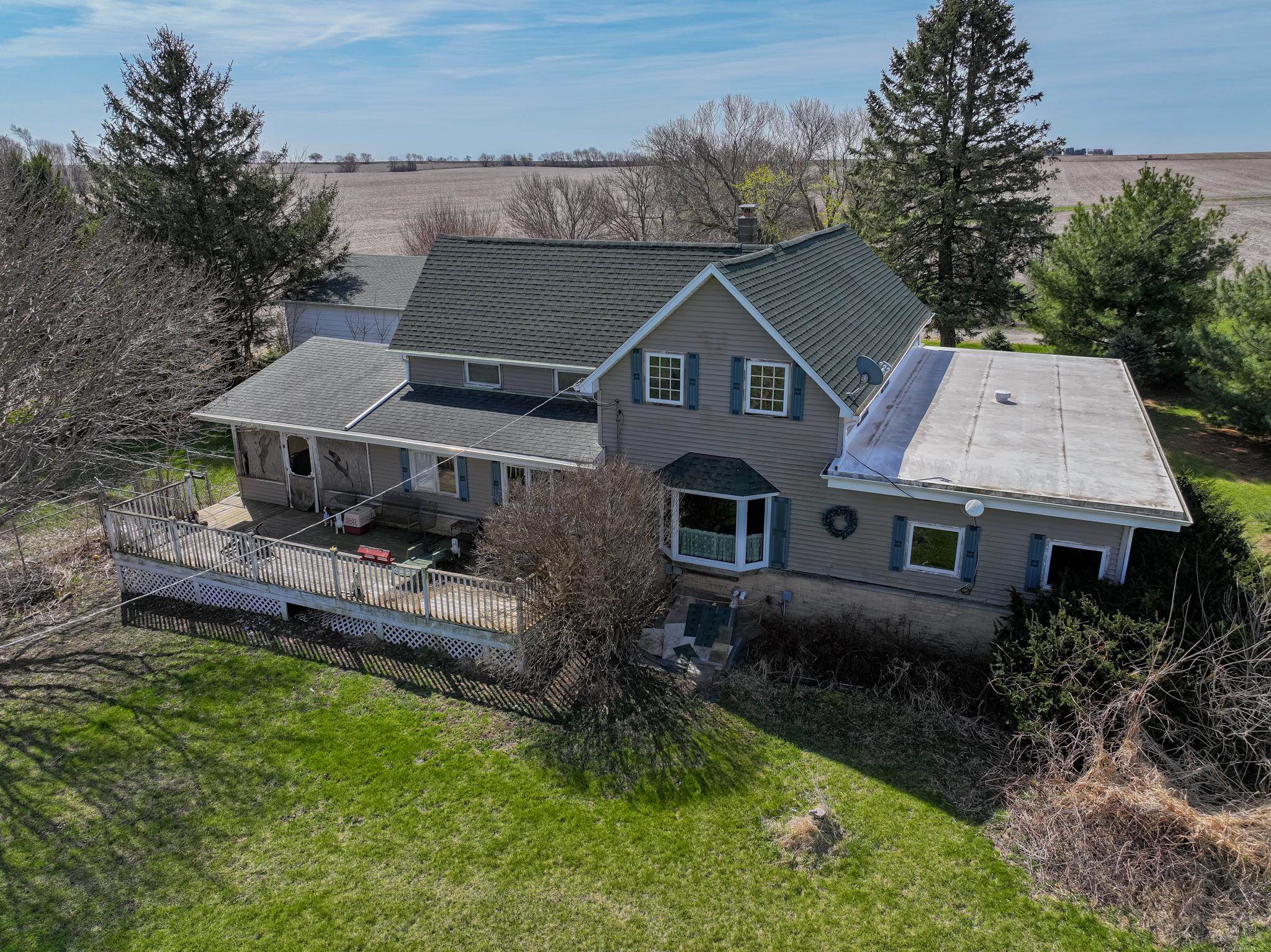 13965 East Dutch Road Rochelle, IL 61068 - Photo 3 of 50 an aerial view of a house with a yard