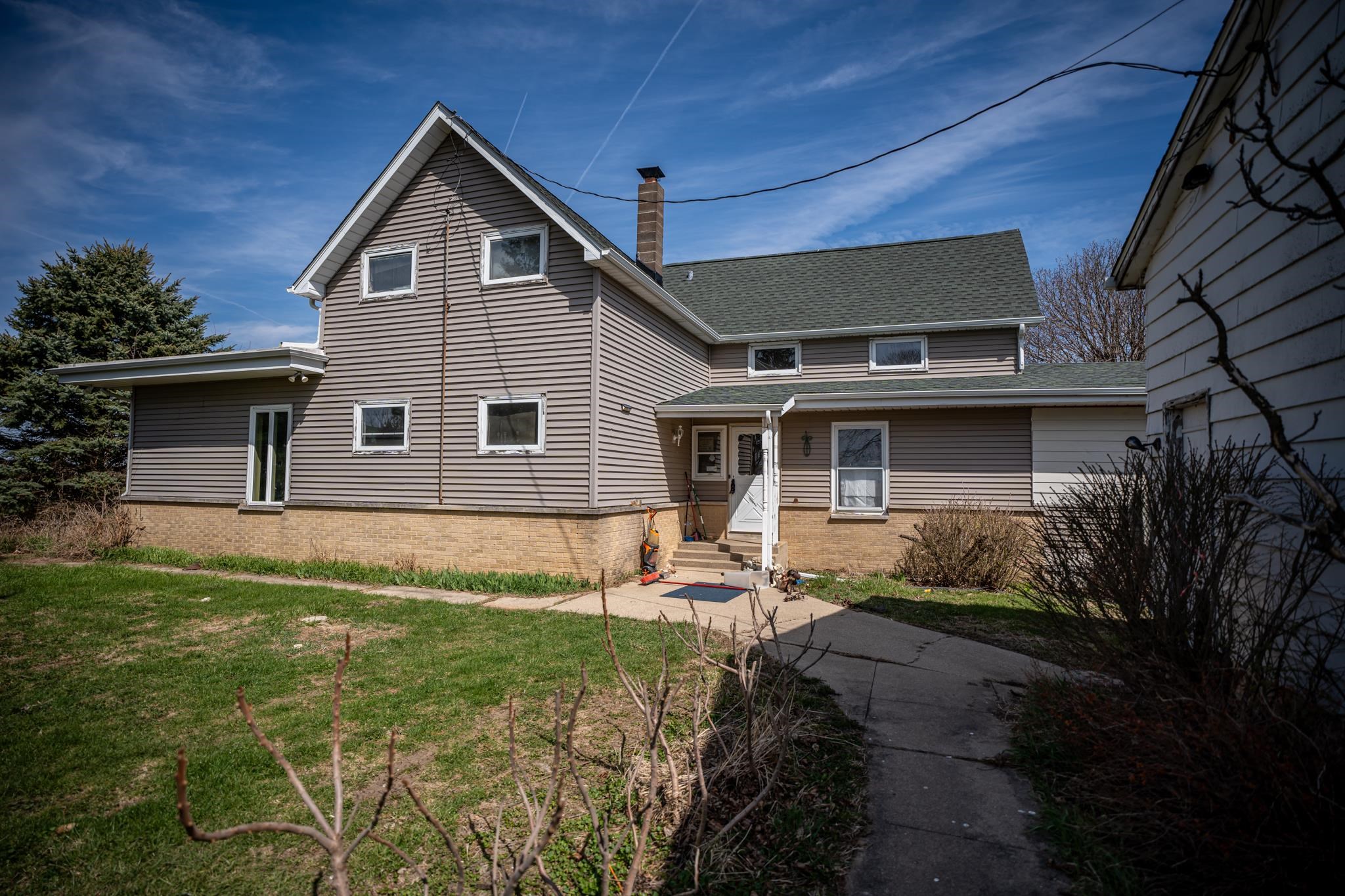 13965 East Dutch Road Rochelle, IL 61068 - Photo 32 of 50 a front view of house with yard outdoor seating and barbeque oven