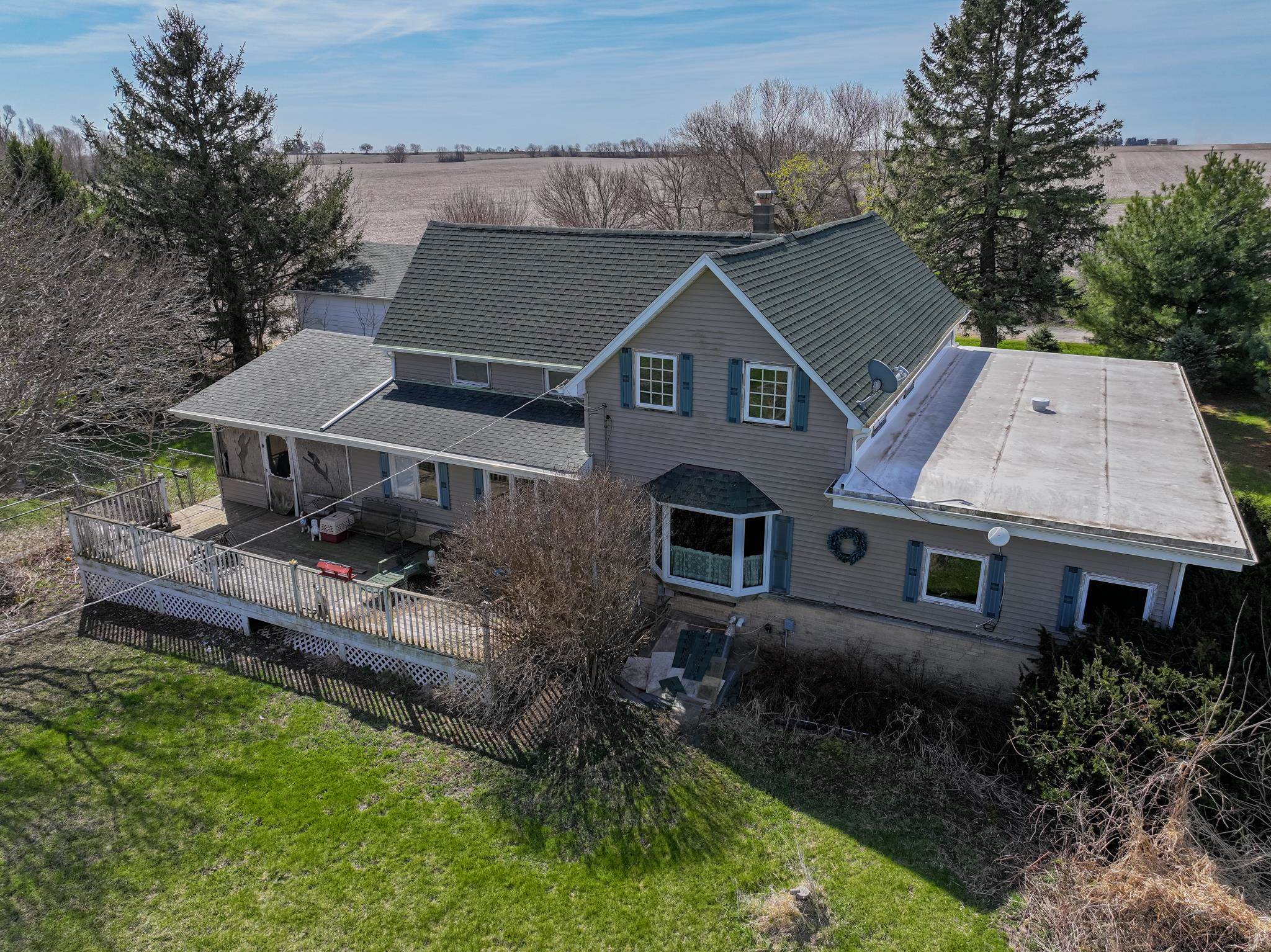 13965 East Dutch Road Rochelle, IL 61068 - Photo 38 of 50 an aerial view of a house with a yard