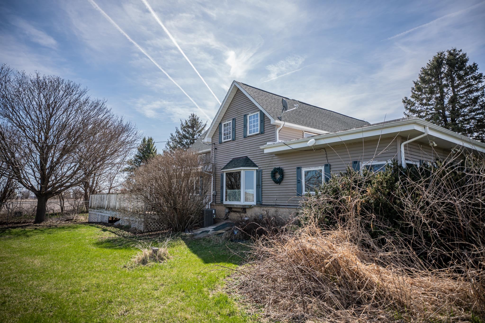 13965 East Dutch Road Rochelle, IL 61068 - Photo 39 of 50 a front view of house with a garden