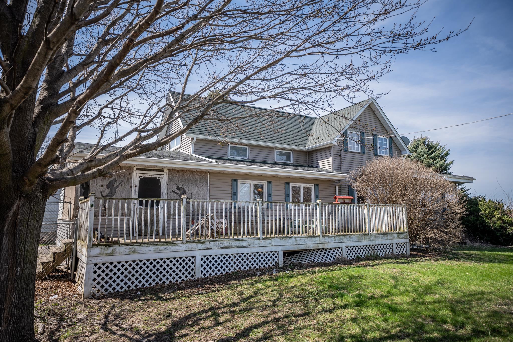 13965 East Dutch Road Rochelle, IL 61068 - Photo 5 of 50 a front view of a house with a garden