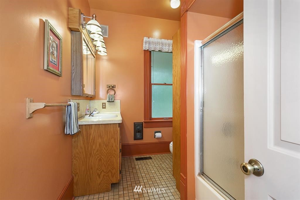 31 Center Road Chimacum, WA 98325 - Photo 20 of 35 a bathroom with a granite countertop shower and a sink