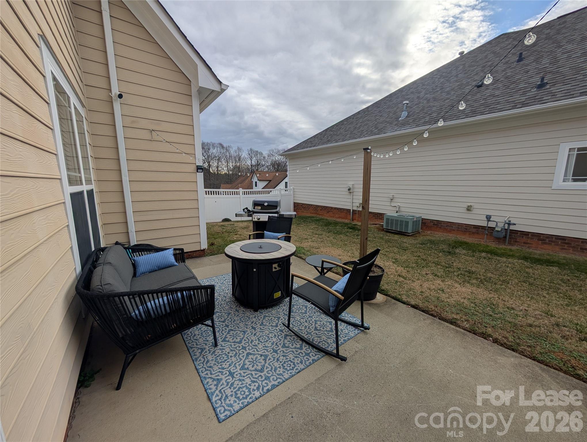 20207 Colony Point Lane Cornelius, NC 28031 - Photo 24 of 26 a view of a patio with couches and potted plants