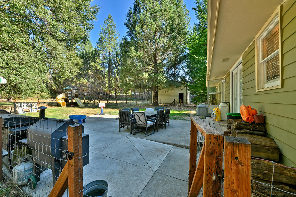 6324 East Evans Creek Road Rogue River, OR 97537 - Photo 20 of 31 an outdoor space with patio furniture and a fire pit