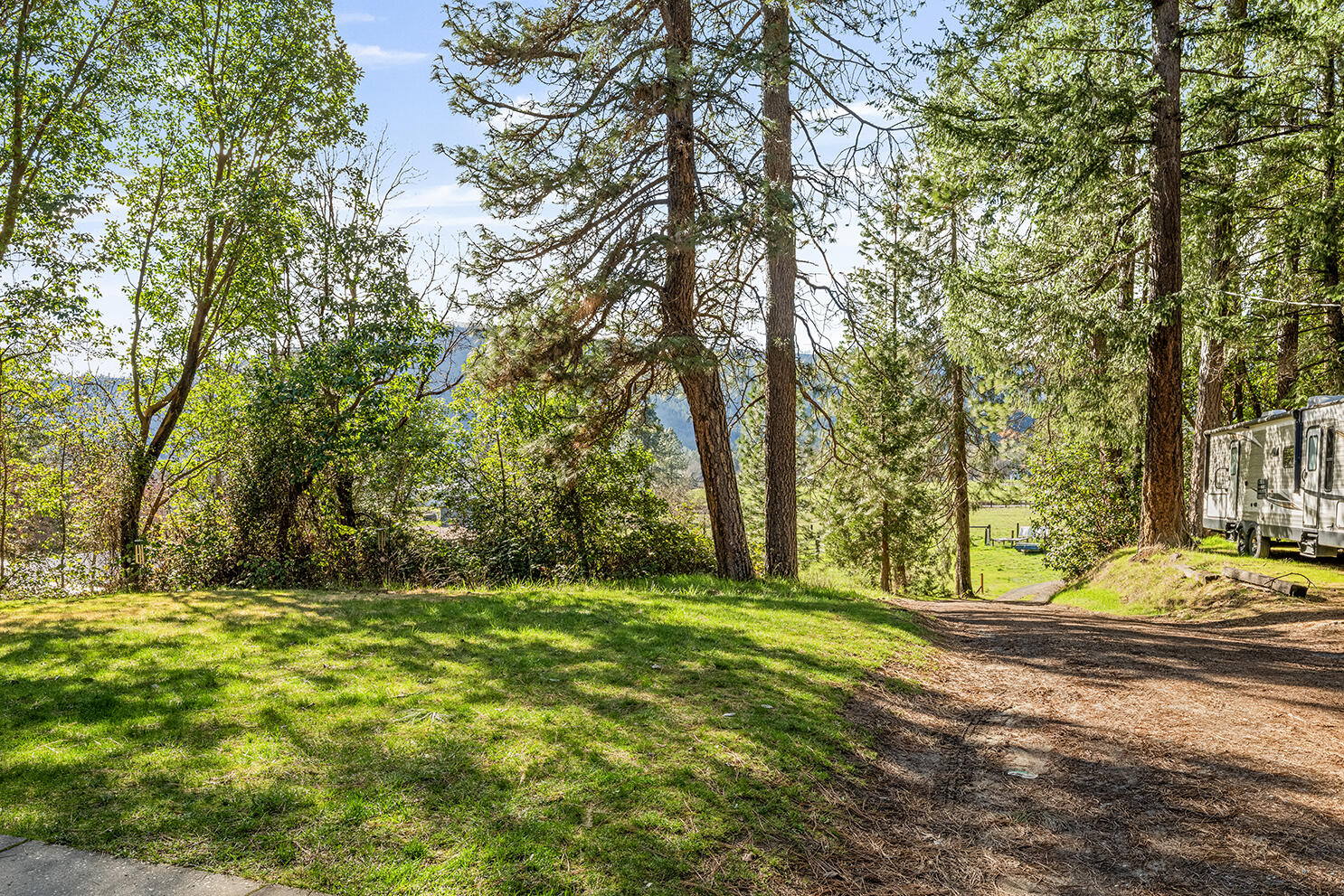6324 East Evans Creek Road Rogue River, OR 97537 - Photo 26 of 31 a view of a yard with trees