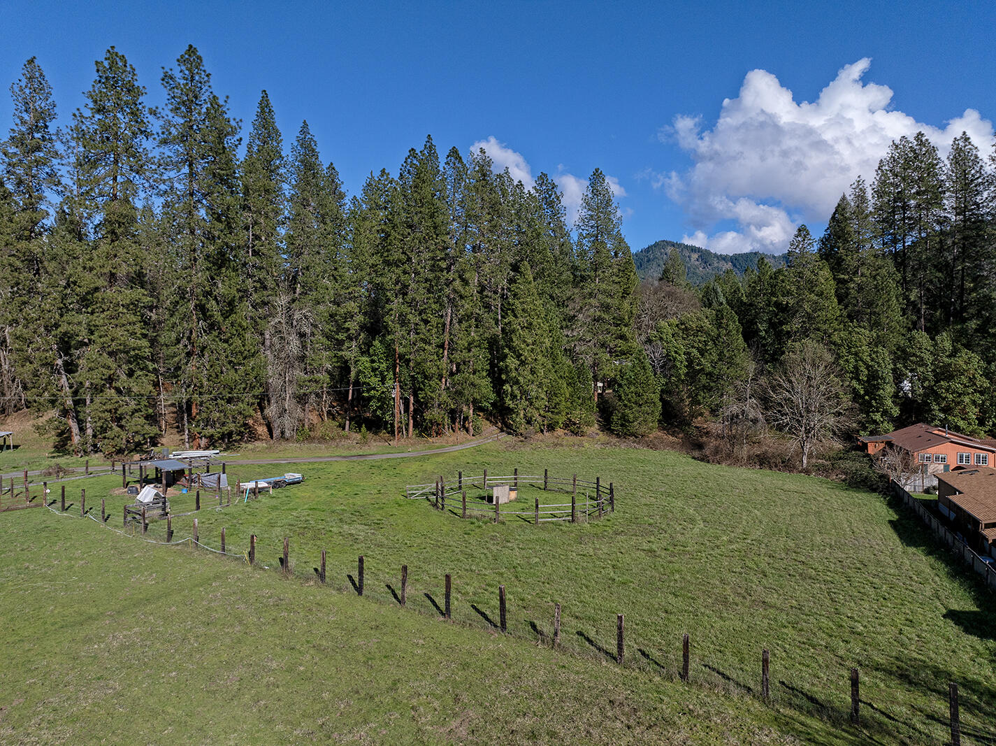 6324 East Evans Creek Road Rogue River, OR 97537 - Photo 3 of 31 a view of a grassy area