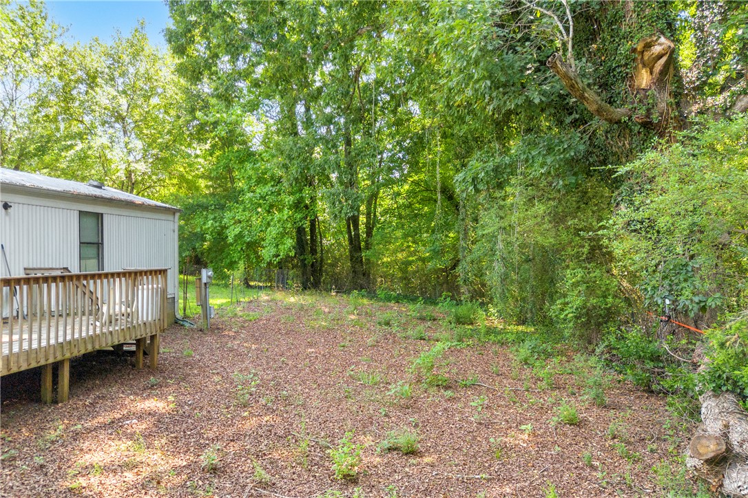 150 Newberry Road Walhalla, SC 29691 - Photo 29 of 47 Relax on the ample deck overlooking the private, wooded backyard.