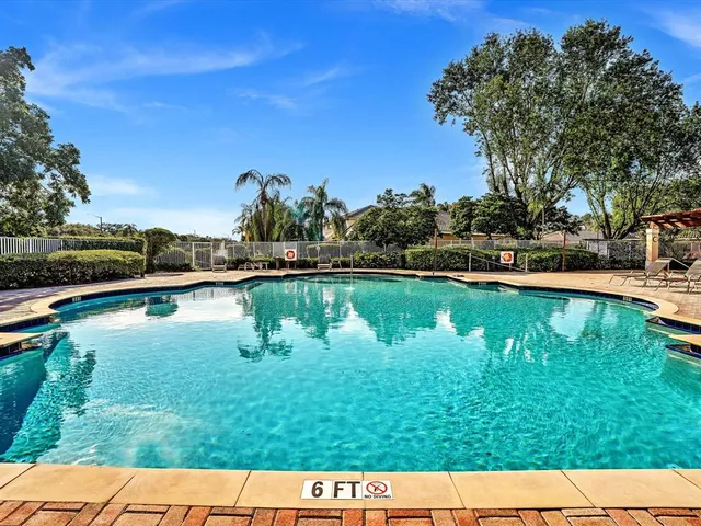 a view of a patio with a table chairs and a patio