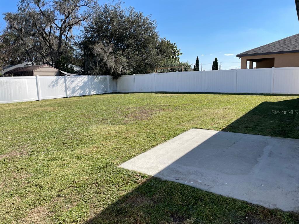 4824 Osprey Way Winter Haven, FL 33881 - Photo 3 of 5 a view of an outdoor space and a yard