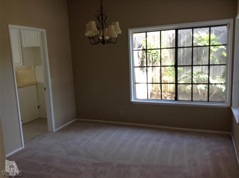 4376 Laurelhurst Road Moorpark, CA 93021 - Photo 3 of 10 an empty room with a empty space and windows