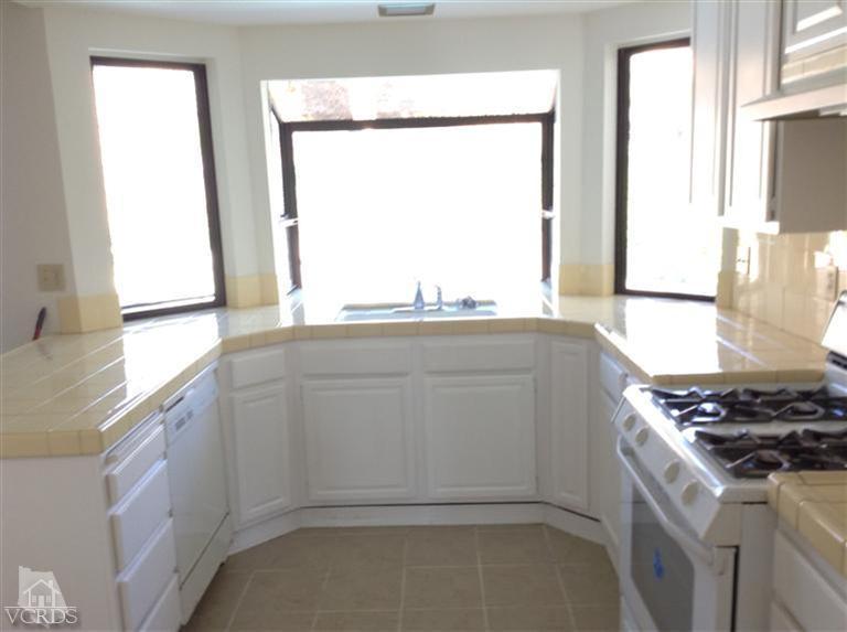 4376 Laurelhurst Road Moorpark, CA 93021 - Photo 4 of 10 a kitchen with a sink and a window