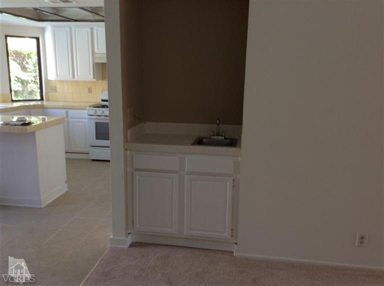 4376 Laurelhurst Road Moorpark, CA 93021 - Photo 5 of 10 a bathroom with a sink toilet and window