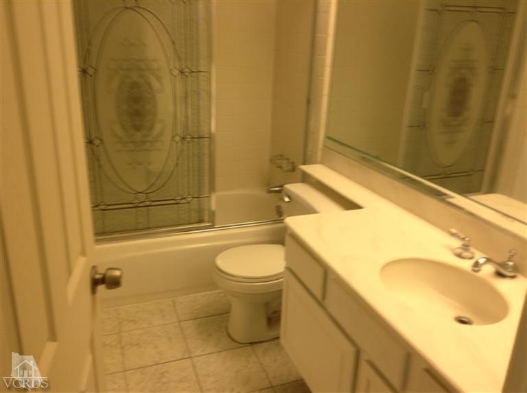 4376 Laurelhurst Road Moorpark, CA 93021 - Photo 6 of 10 a bathroom with a sink toilet and shower