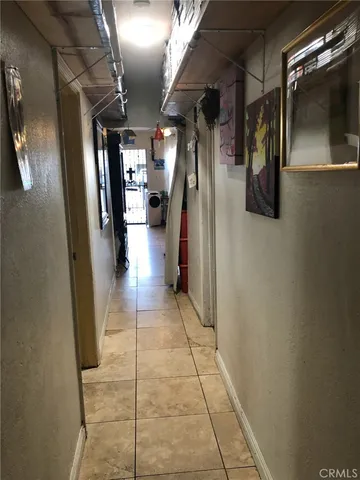 a room with gym equipment and a large window