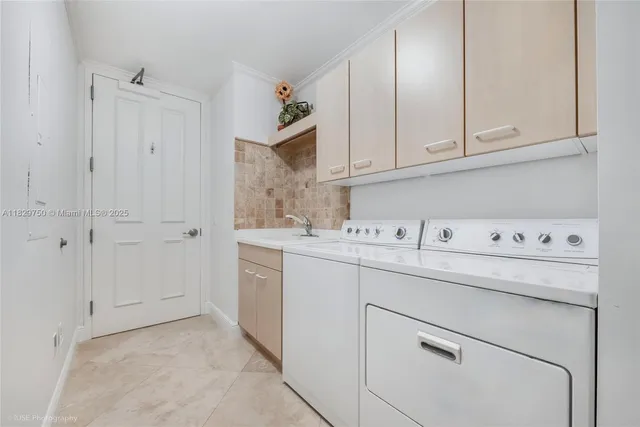 $2,400,000 | 13621 Deering Bay Drive, Unit 502, Coral Gables, FL 33158