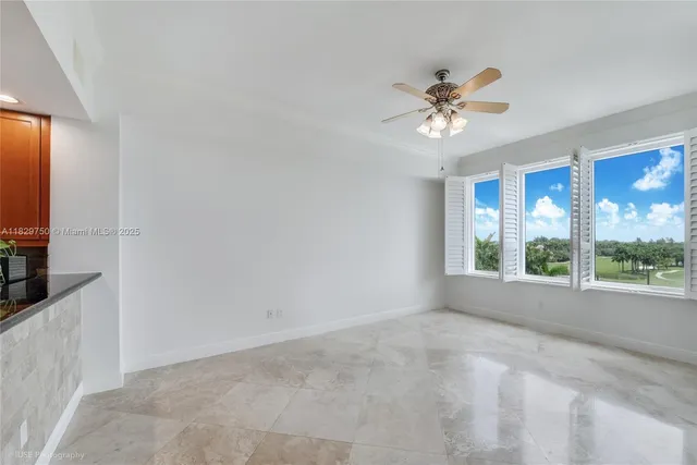 $2,400,000 | 13621 Deering Bay Drive, Unit 502, Coral Gables, FL 33158
