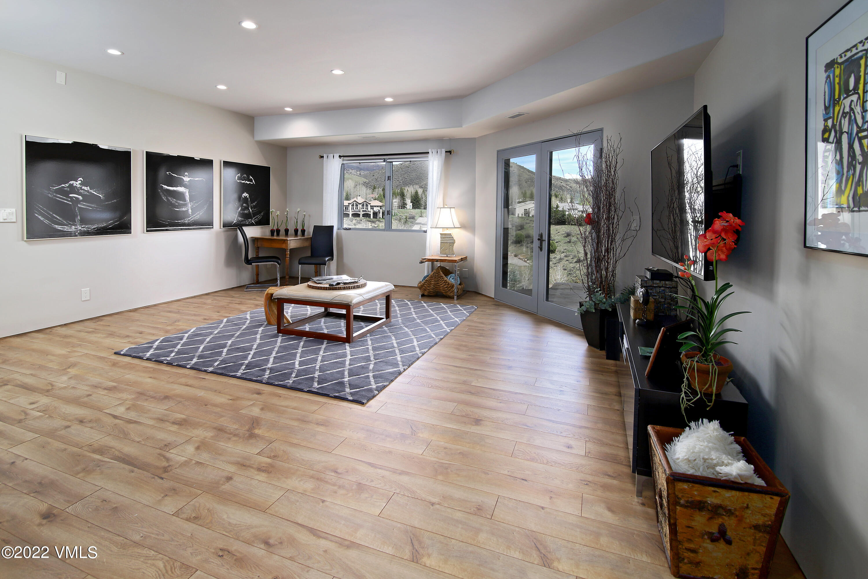 11 Chute Circle Edwards, CO 81632 - Photo 17 of 18 a living room with furniture window and wooden floor