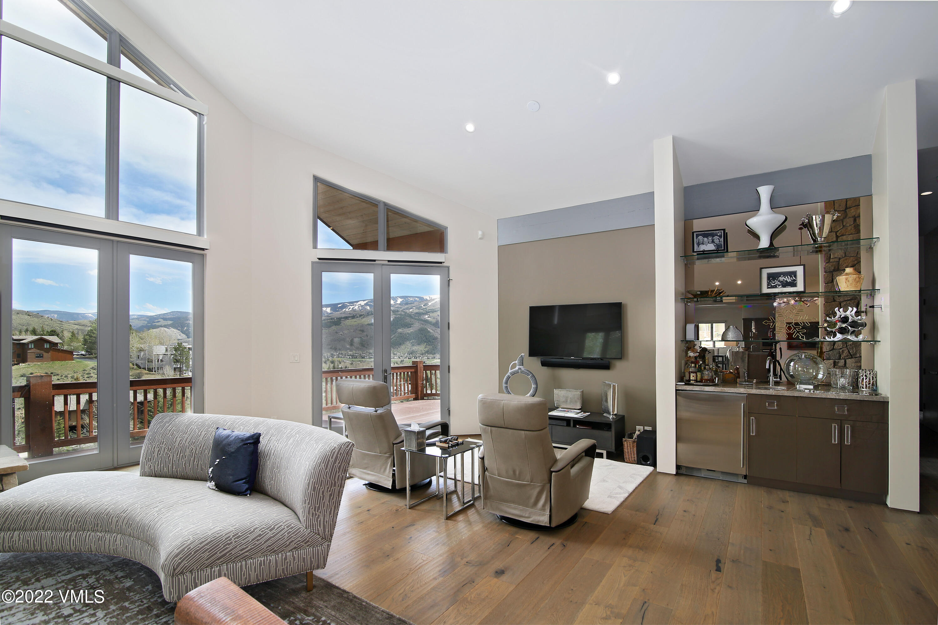 11 Chute Circle Edwards, CO 81632 - Photo 2 of 18 a living room with furniture and a flat screen tv