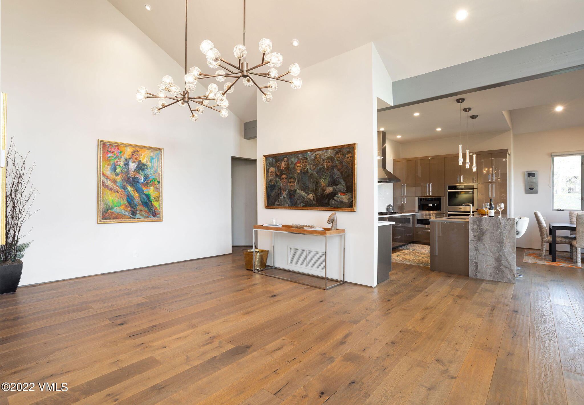 11 Chute Circle Edwards, CO 81632 - Photo 4 of 18 a view of a living room and kitchen with a flat screen tv