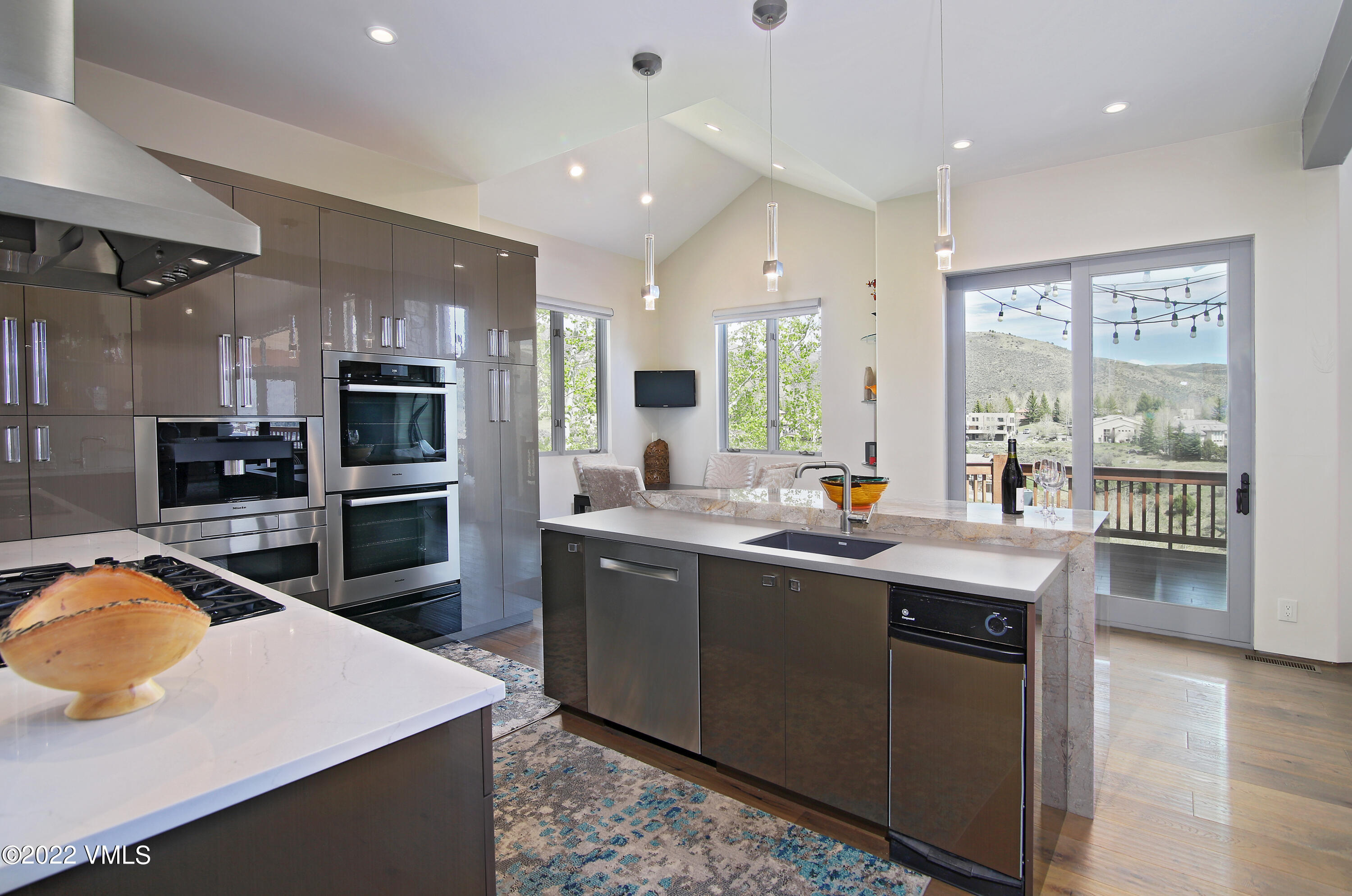11 Chute Circle Edwards, CO 81632 - Photo 5 of 18 a kitchen with stainless steel appliances a sink stove and refrigerator