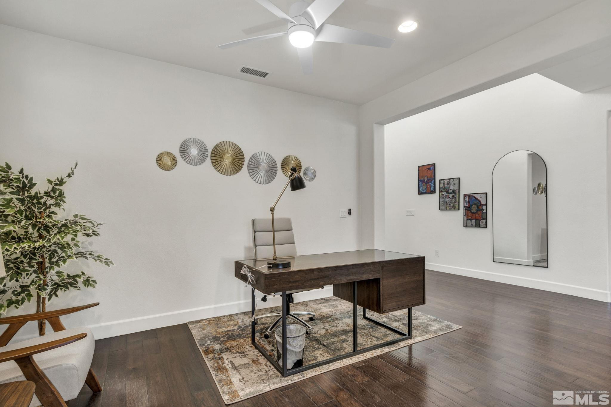 10345 Rollins Drive Reno, NV 89521 - Photo 13 of 39 a workspace with furniture and wooden floor