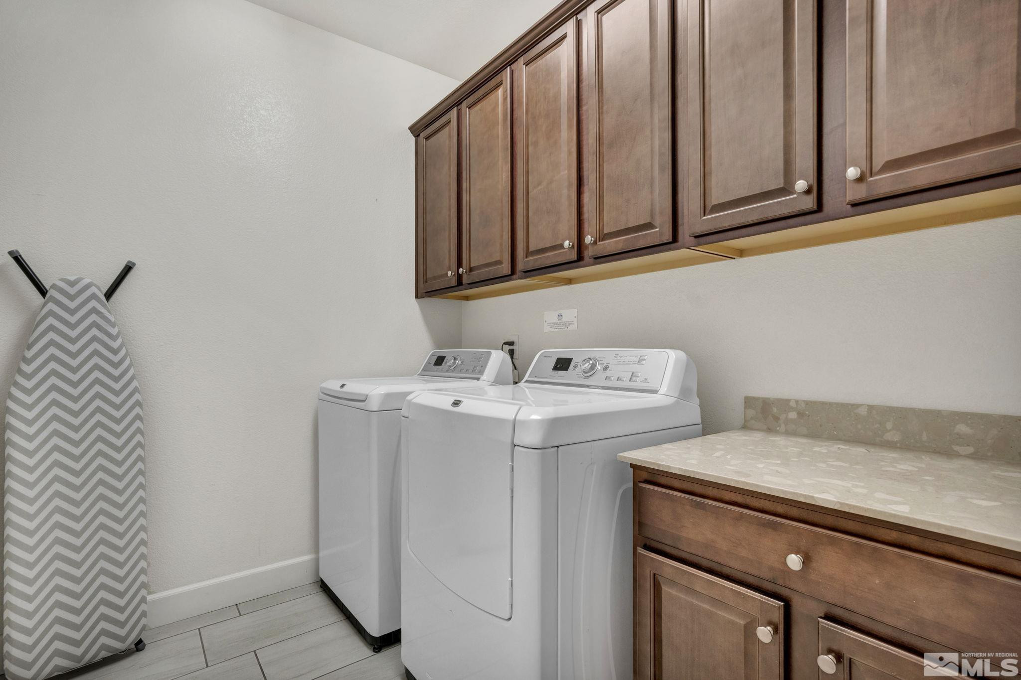 10345 Rollins Drive Reno, NV 89521 - Photo 32 of 39 a utility room with dryer and washer