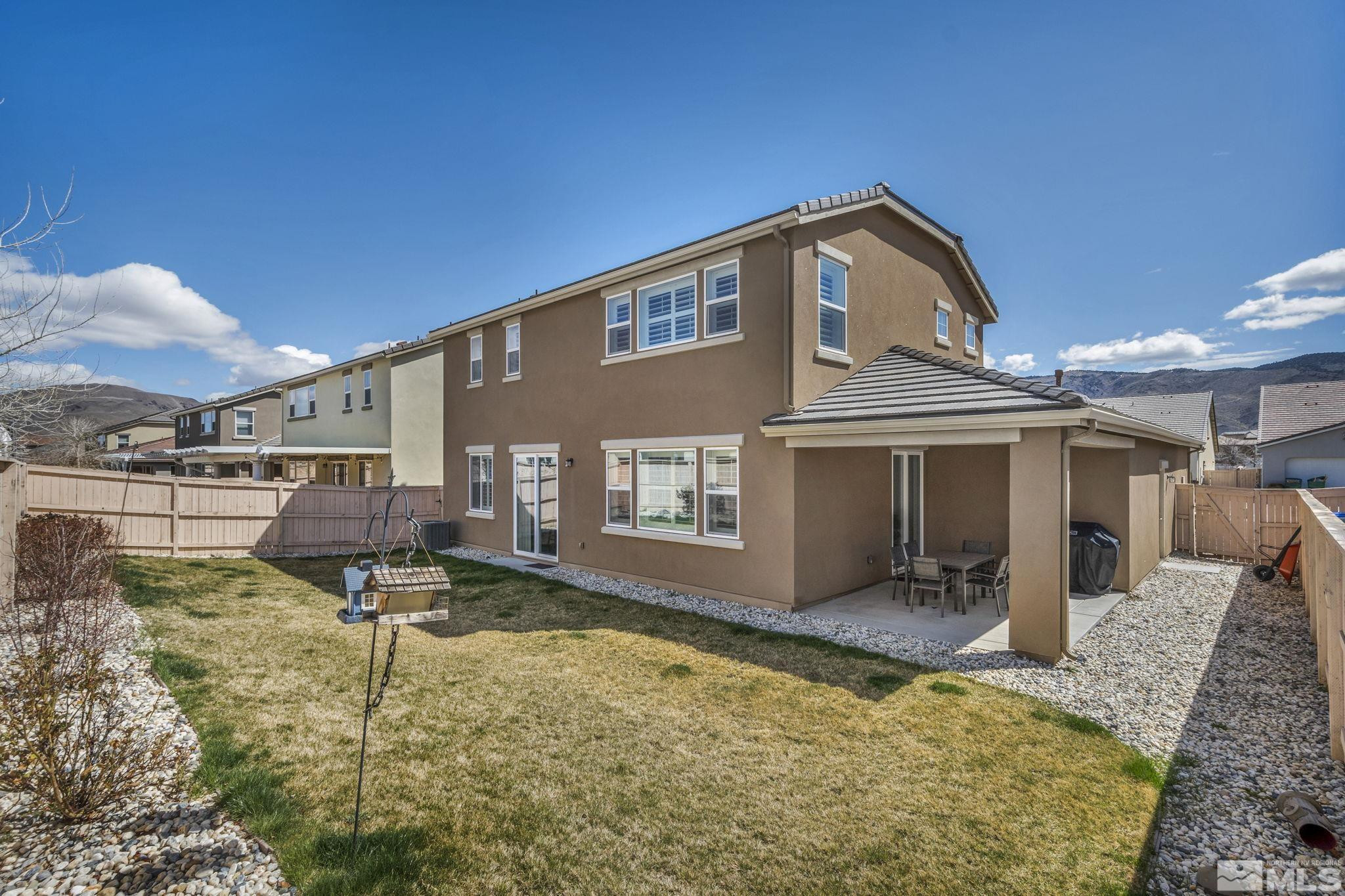 10345 Rollins Drive Reno, NV 89521 - Photo 36 of 39 a swimming pool with outdoor seating and yard