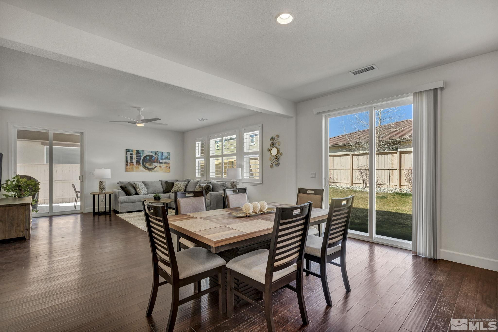 10345 Rollins Drive Reno, NV 89521 - Photo 7 of 39 a dining room with furniture window and wooden floor