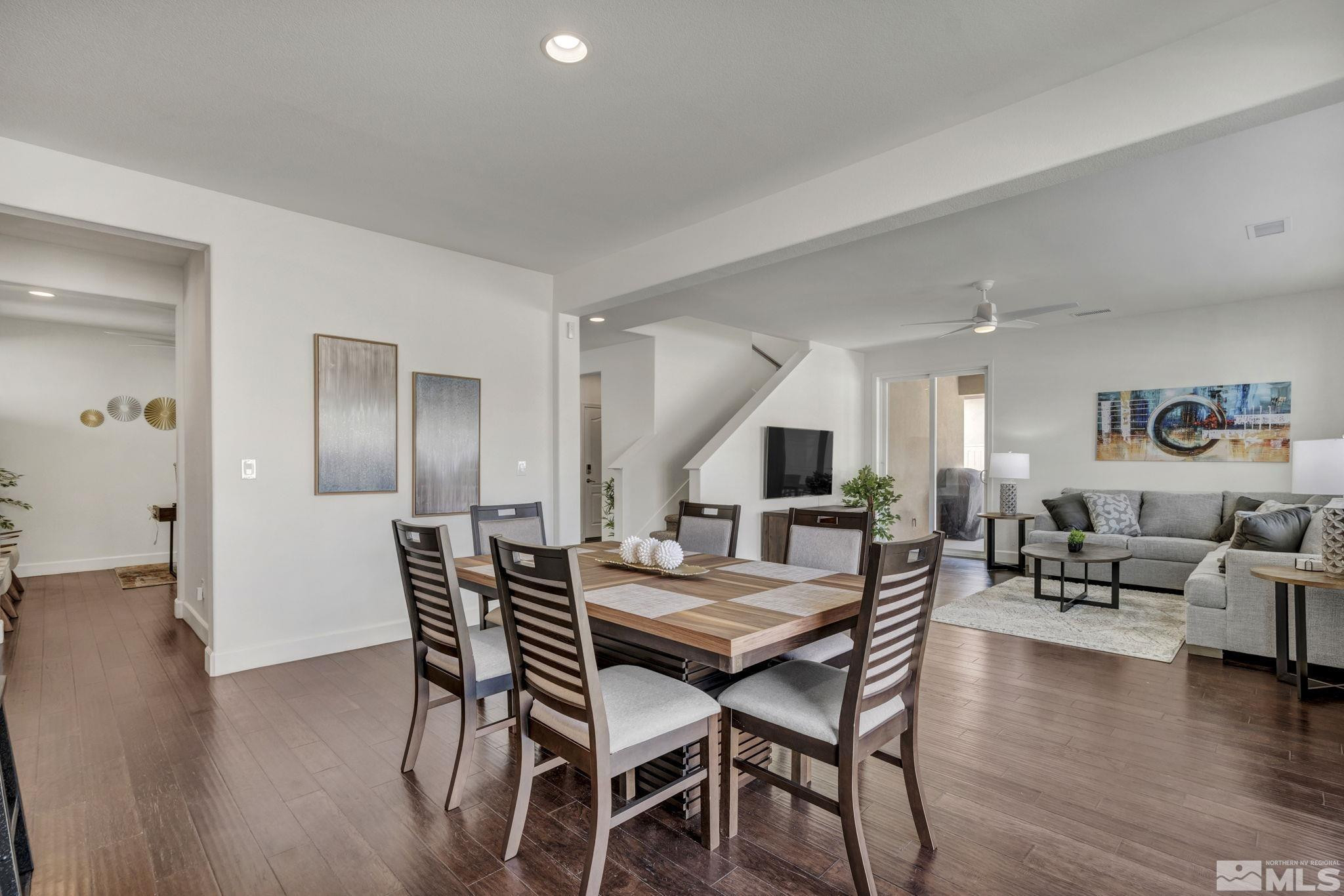 10345 Rollins Drive Reno, NV 89521 - Photo 8 of 39 a dining room with furniture and wooden floor