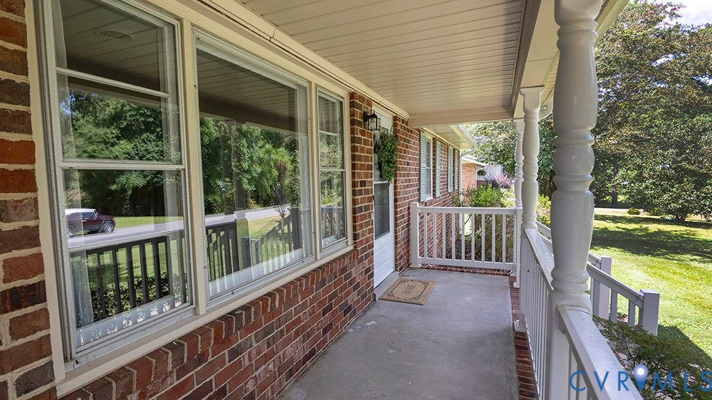 7397 Ewell Road Mechanicsville, VA 23111 - Photo 40 of 42 Covered porch with a sunroom