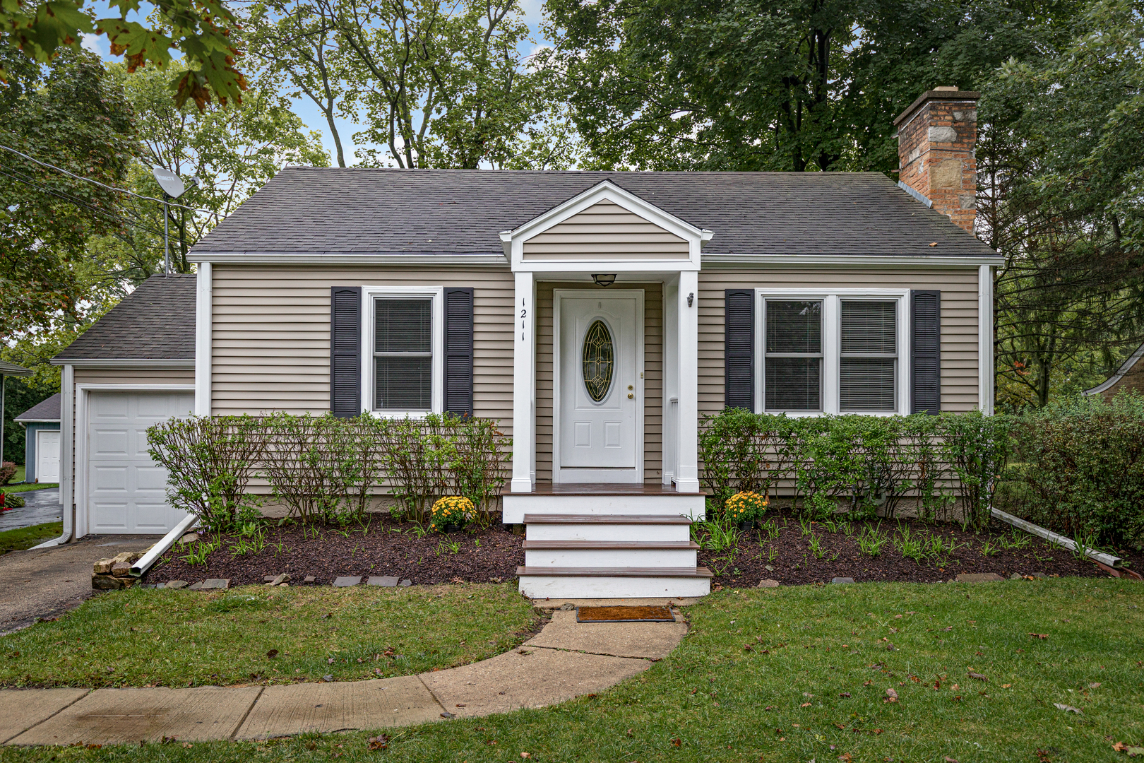 1211 Telegraph Road Lake Forest, IL 60045 - Photo 1 of 21 a front view of a house with a yard
