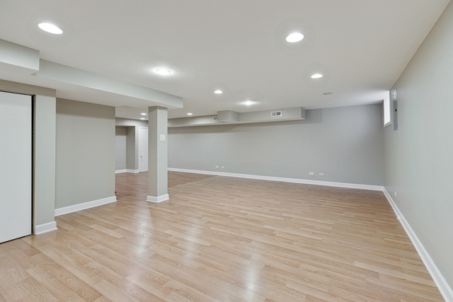1211 Telegraph Road Lake Forest, IL 60045 - Photo 15 of 21 a view of an empty room with wooden floor