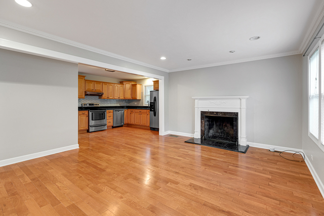 1211 Telegraph Road Lake Forest, IL 60045 - Photo 3 of 21 a view of an empty room with a fireplace