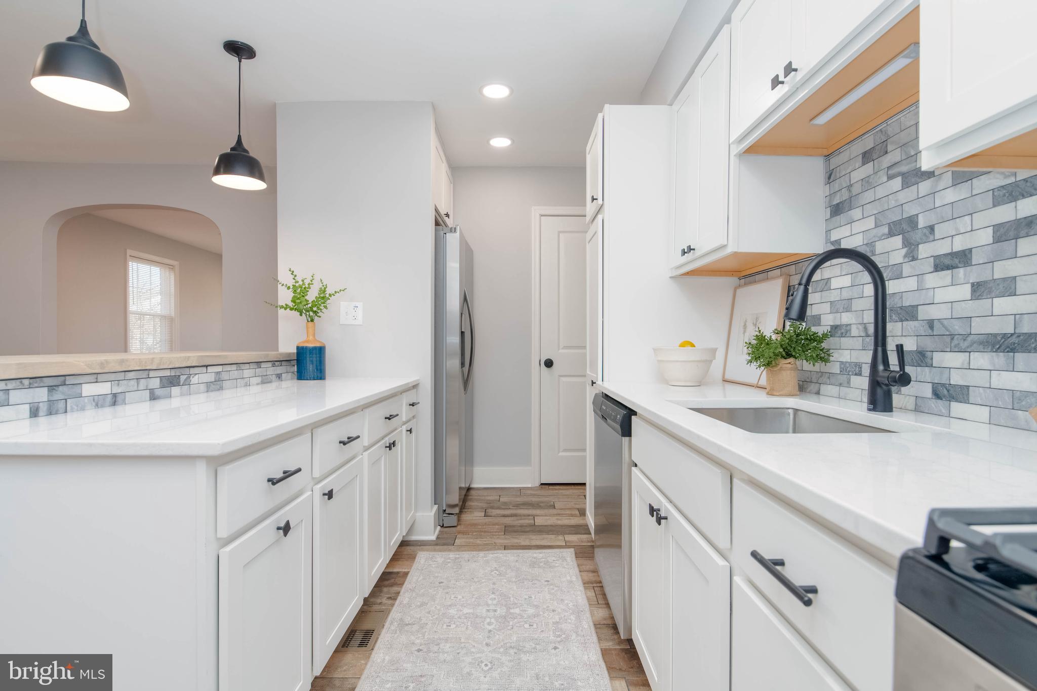 136 Dumbarton Road Baltimore, MD 21212 - Photo 8 of 42 All new cabinets and appliances w deep sink.