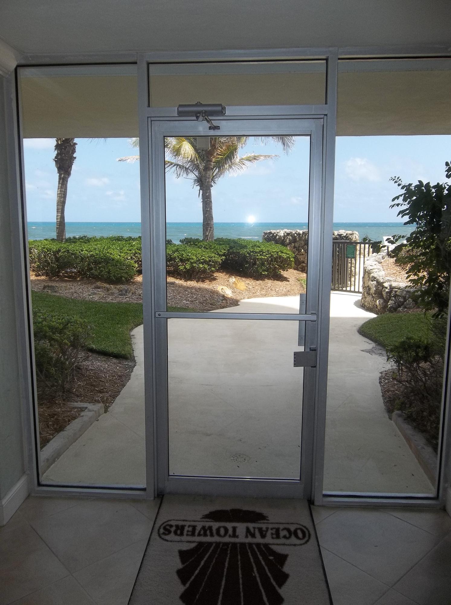 200 South Beach Road, Unit 102 Tequesta, FL 33469 - Photo 9 of 33 walk way to beach