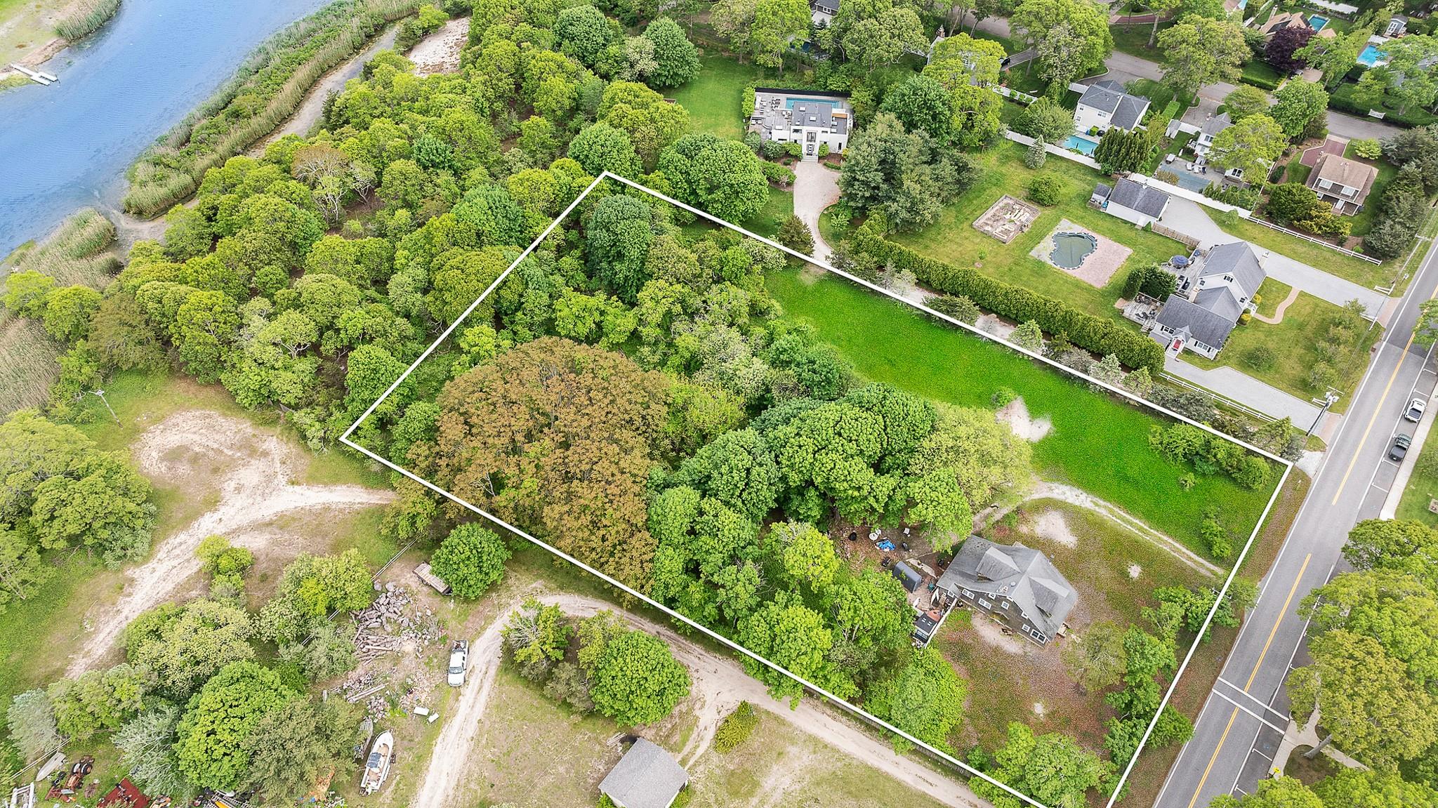 26 Mill Road Remsenburg, NY 11960 - Photo 3 of 7 a view of a city from a balcony