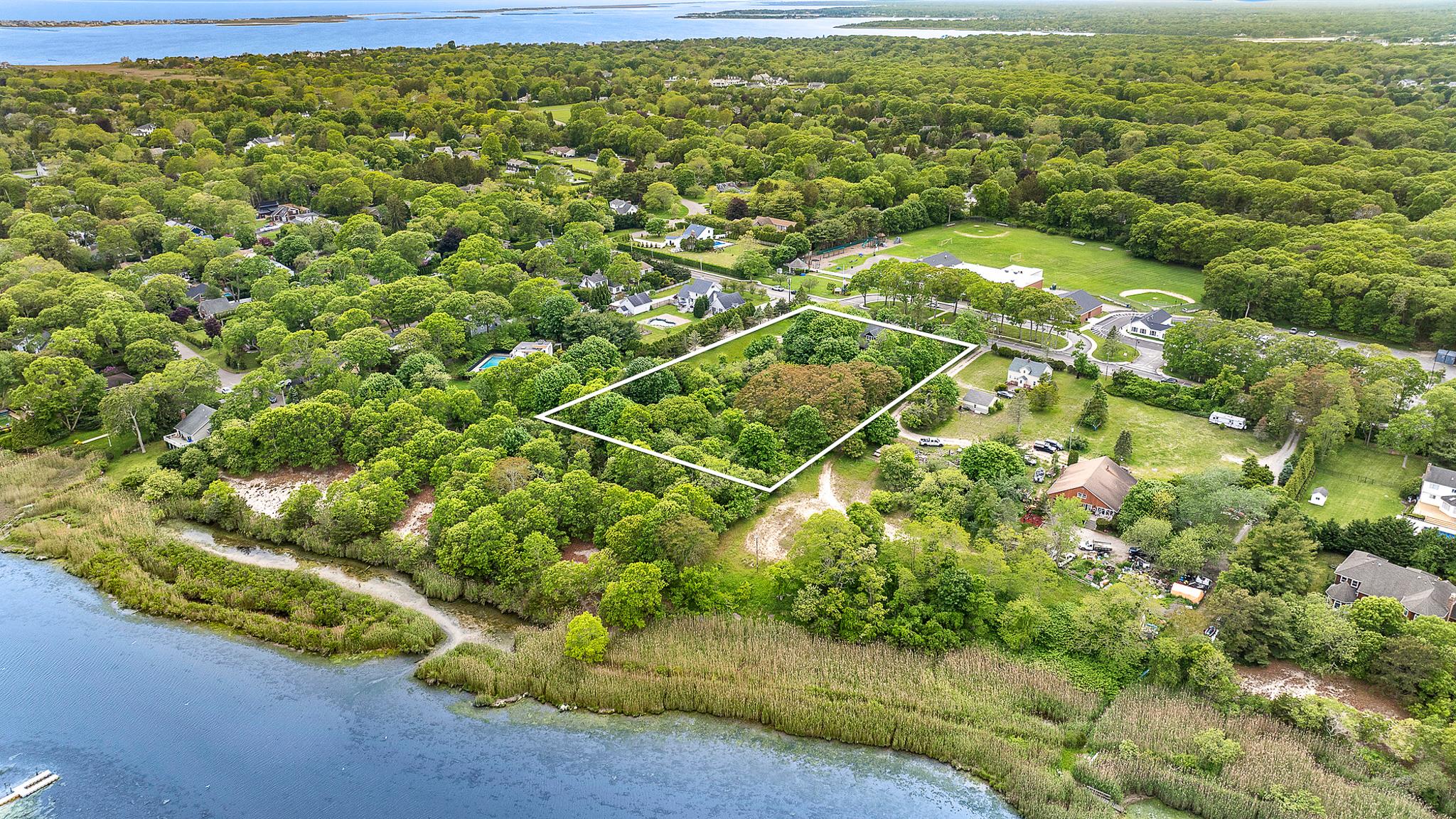 26 Mill Road Remsenburg, NY 11960 - Photo 6 of 7 a view of a yard with an outdoor space