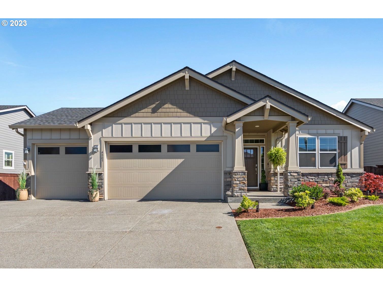 4805 South 17th Way Ridgefield, WA 98642 - Photo 1 of 33 a front view of a house with garden