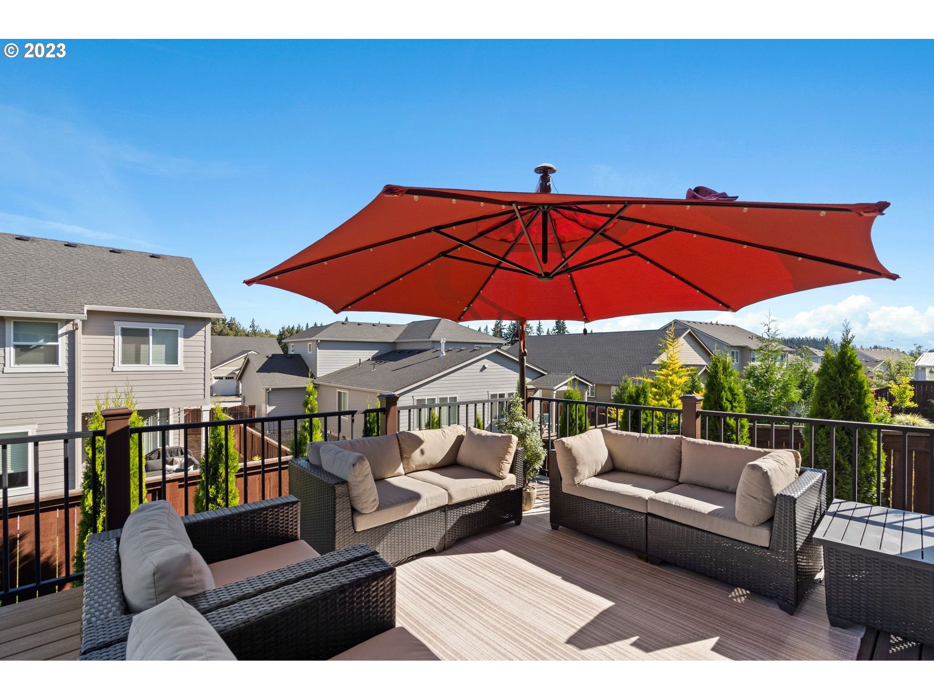 4805 South 17th Way Ridgefield, WA 98642 - Photo 28 of 33 a view of sitting area with furniture and umbrella